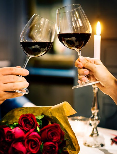 Celebrate Your Anniversary with a Romantic Candlelight Dinner at a Waterfront Restaurant