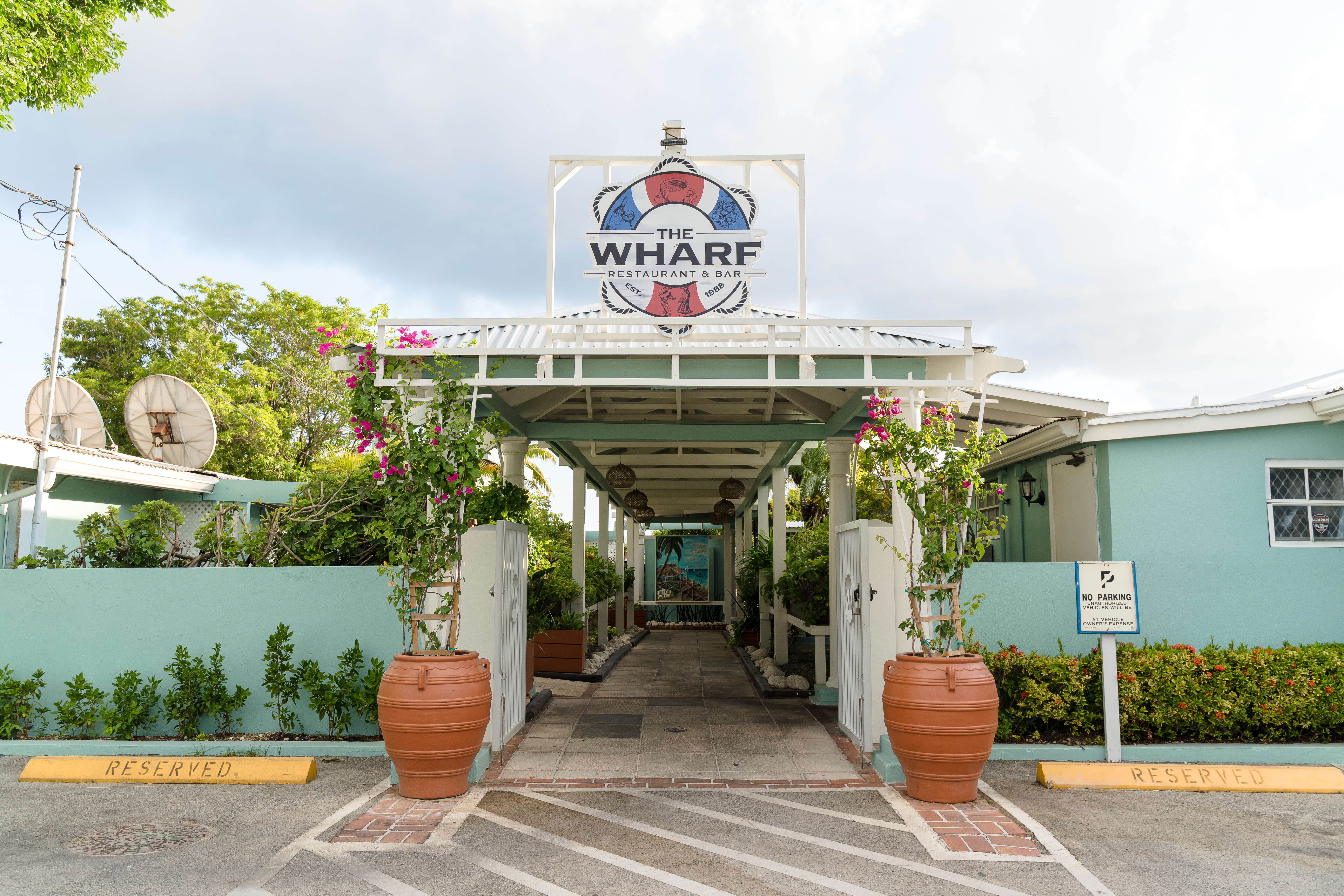 37 Years on Seven Mile Beach: The History of The Wharf Since 1988