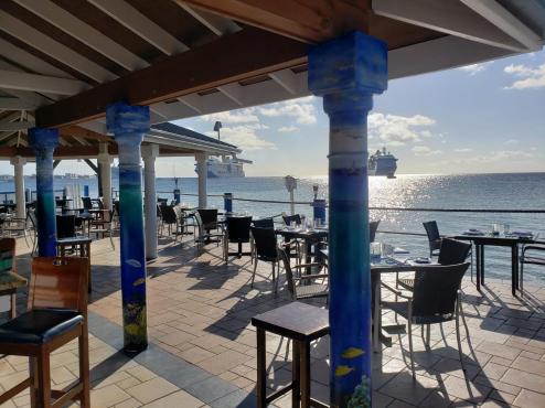 Waterfront dining at The Wharf at the beginning of 7 Mile Beach